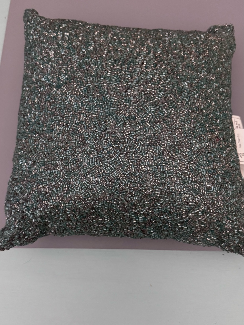 Turquoise beaded pillow